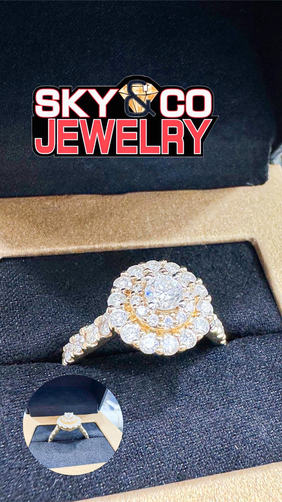 Elaborate diamond engagement ring with double halo setting in a Main & Stone box