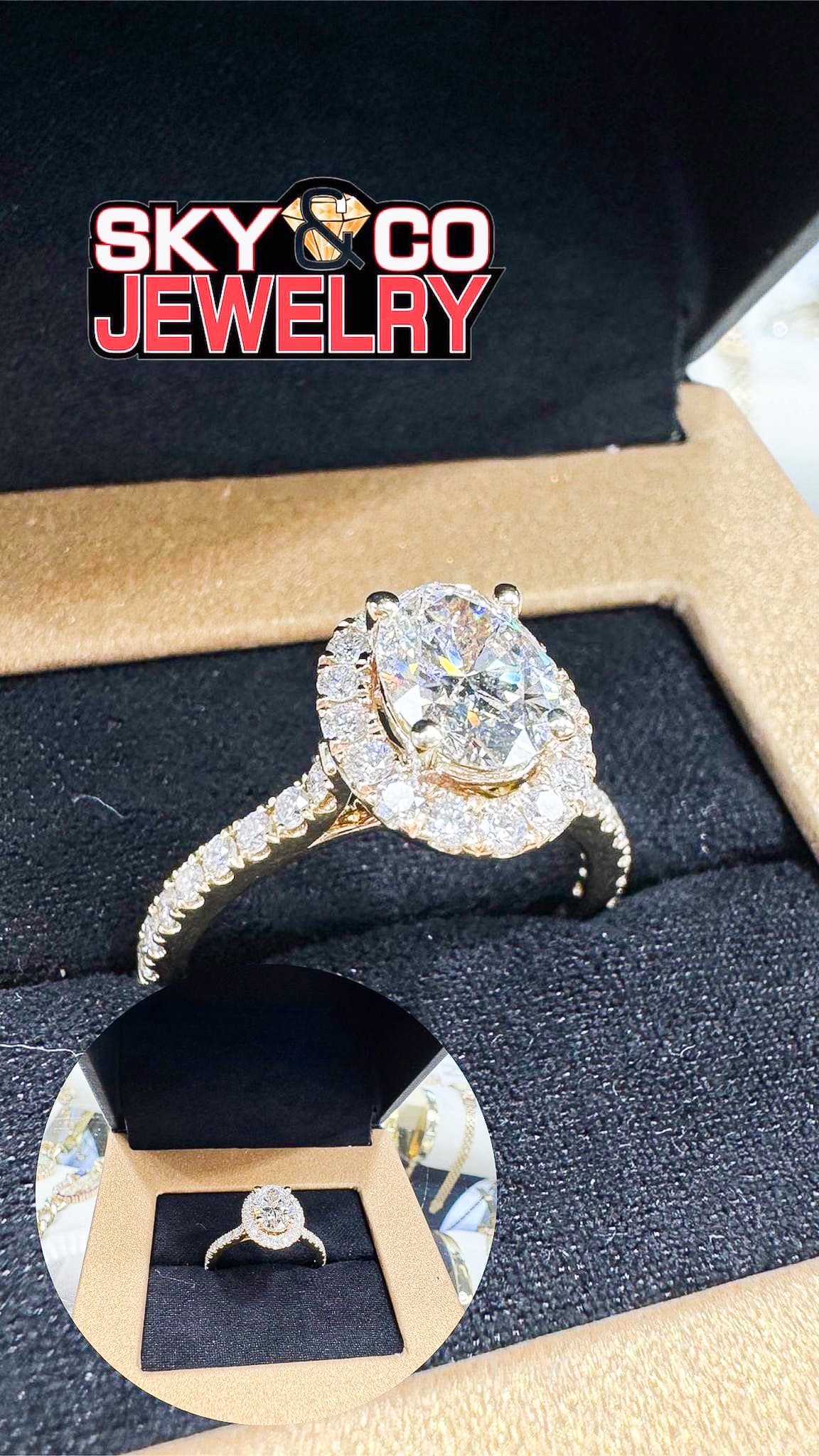 Magnificent oval diamond engagement ring with halo setting in a Main & Stone presentation box