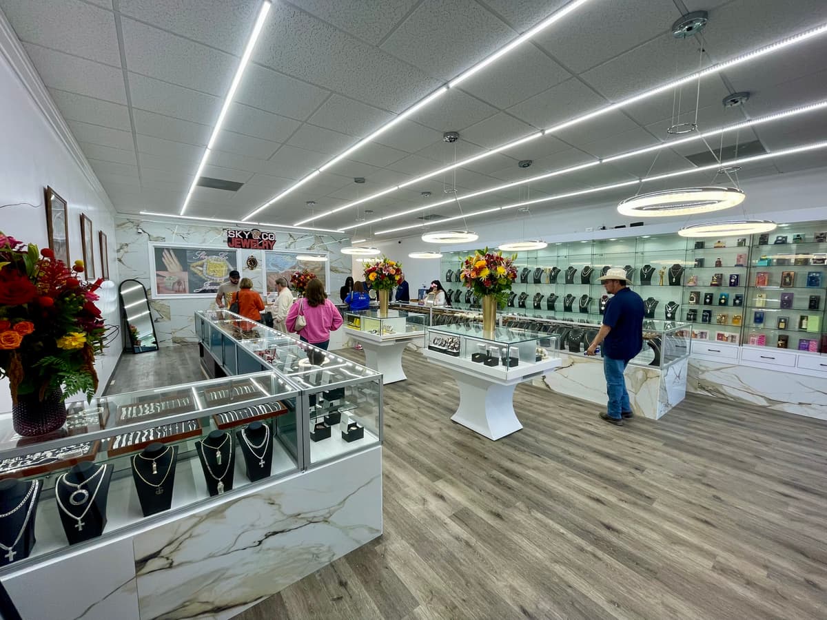 Full showroom interior with marble display cases